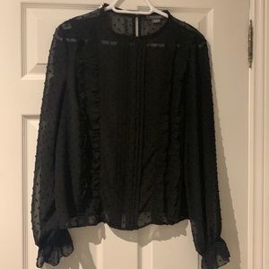 Women’s black sheer polka dot blouse from Suzy Shier